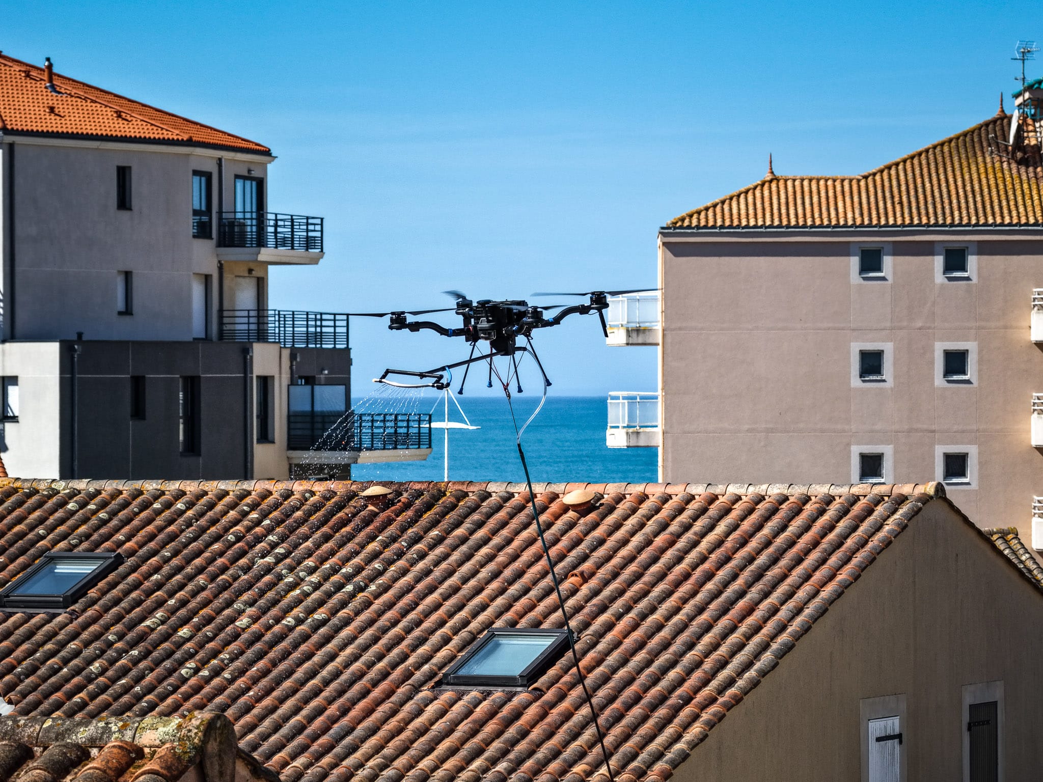 démoussage de pavillons par drone